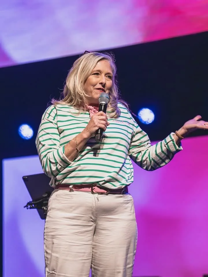 Kim Kjos speaking at a past Priceless conference